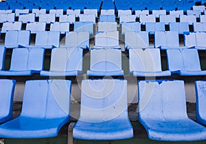 Empty blue seats or chair rows in stadium