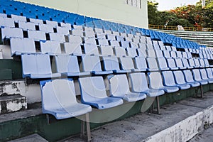 Empty blue seats or chair rows in stadium