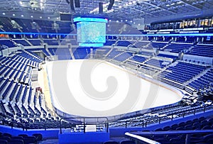 Empty blue seats at hockey rink