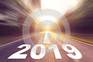 Empty blur asphalt road and New year 2019 concept. Driving on an