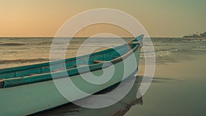 Empty boat on sandy beach in bright day. Large old white boat on sandy seaside ready to sail in bright day on beach