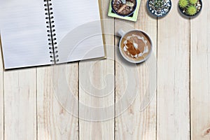 Empty book and art latte on desk, mock up for presentation