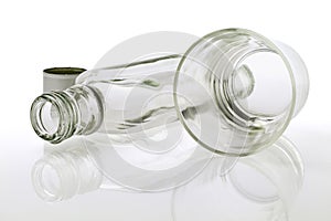 Empty Bottle of Whiskey and Glass