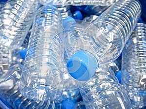 Empty bottled water in big bucket