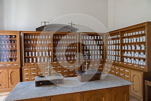 Empty bottles in old vintage pharmacy