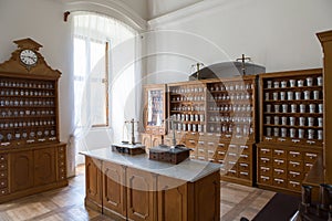 Empty bottles in old vintage pharmacy