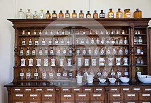 Empty bottles in old vintage pharmacy