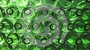 Empty bottles. Slider shot of empty glass bottles. Top view in production line. Empty green beer bottles, the top view