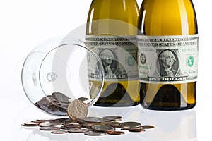 Empty bottles of wine from the label of dollar bill