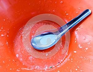 Empty bowl with metal spoon