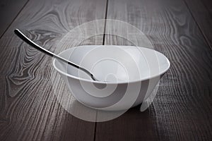 Empty bowl with spoon