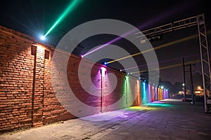 Empty brick wall background, night view, neon light