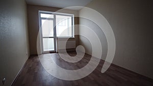 Empty bright living room without furniture. Clip. Interior empty light room without furniture in a new building