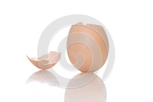 Empty broken egg shell on a white background