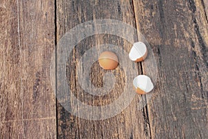 Empty broken egg shell on wooden table background