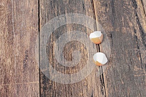 Empty broken egg shell on wooden table background