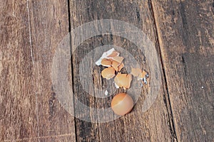 Empty broken egg shell on wooden table background