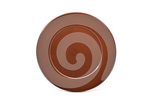 Empty brown earthenware plate