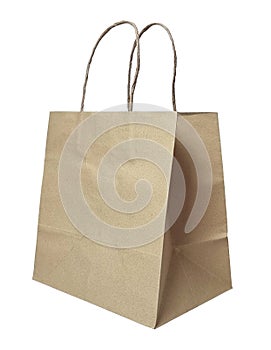 empty brown paper shopping bag isolated on background with clipping path. brown recycled craft paper bag.