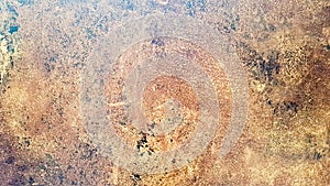 Empty brown sandstone countertop. Flat lay. Copy space. A unique pattern created by nature on the stone, close-up. Natural