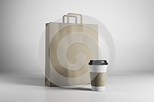 Empty brown shopping bag and coffee