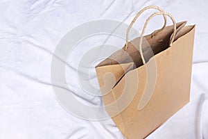 Empty brown shopping bag made of recycled paper