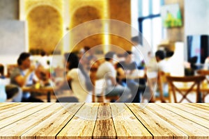 Empty, brown Wood table top Bar with blur light bokeh cafe,restaurant background .Lifestyle and celebration concepts