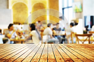 Empty, brown Wood table top Bar with blur light bokeh cafe,restaurant background .Lifestyle and celebration concepts