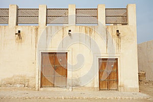 Empty buildings in the desert town of Al Wakrah
