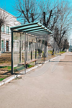 Empty bus stop, A bus stop for public transport in the city on an overcast summer morning