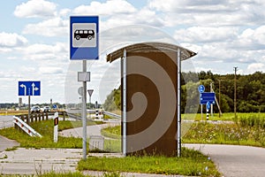 Empty bus stop in the countryside on a sunny summer day