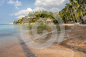 Empty calm sandy tropical Sairee beach in the morning on Koh Tao island