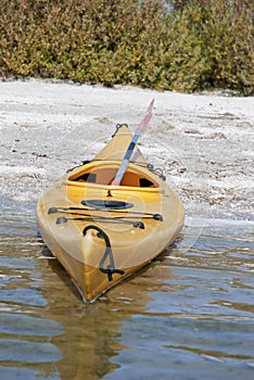 Empty Canoe Beached On Shore