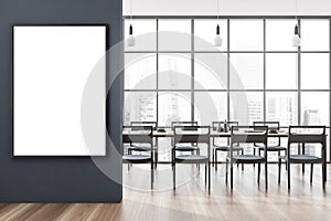 Empty canvas on dark blue dining room wall