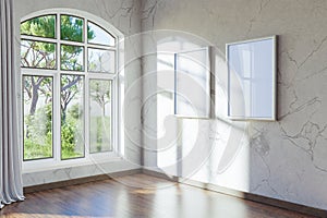 empty canvas poster mock up hanging on a wall empty living room interior bright daylight shining through a large window home