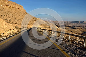 Empty car road in Negev desert near Big crater, Israel,Middle East