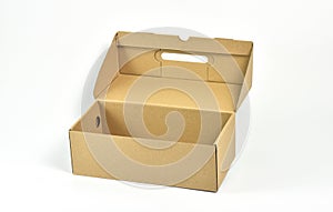 Empty cardboard shoe box isolated on white background