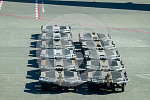Empty cargo transports site idle on airport runway