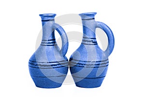 Empty ceramic jag on a white background. Toned