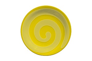 Yellow ceramic round plate isolated on white background