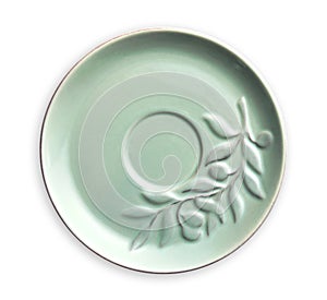 Empty ceramics plates, Green plate with leaf pattern, View from above isolated on white background with clipping path