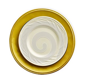 Empty ceramics plates, White plate on yellow plate isolated on white background with clipping path, Top view