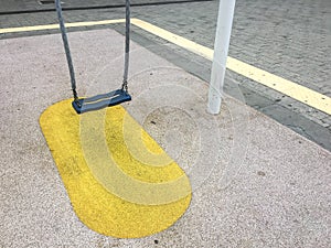 Empty chain swings in children playground