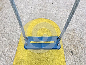 Empty chain swings in children playground