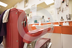 Empty chair in barbershop