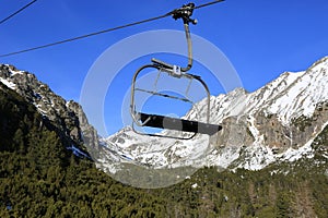 Empty chair lift in sky resort