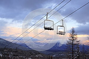 Empty Chair Lifts at a Ski Slope