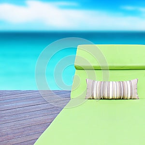 Empty chair on sea background