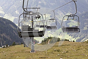 Empty chairlift in Austrian Alps.