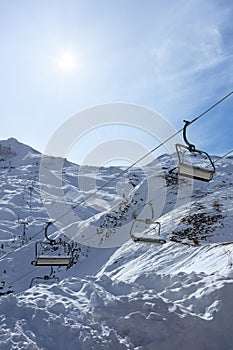 Empty chairlift in a closed ski station